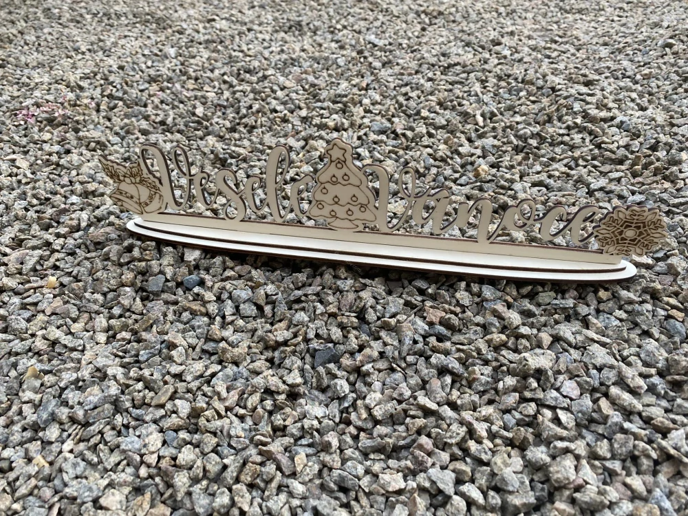 Nápis Veselé Vánoce se stojánkem